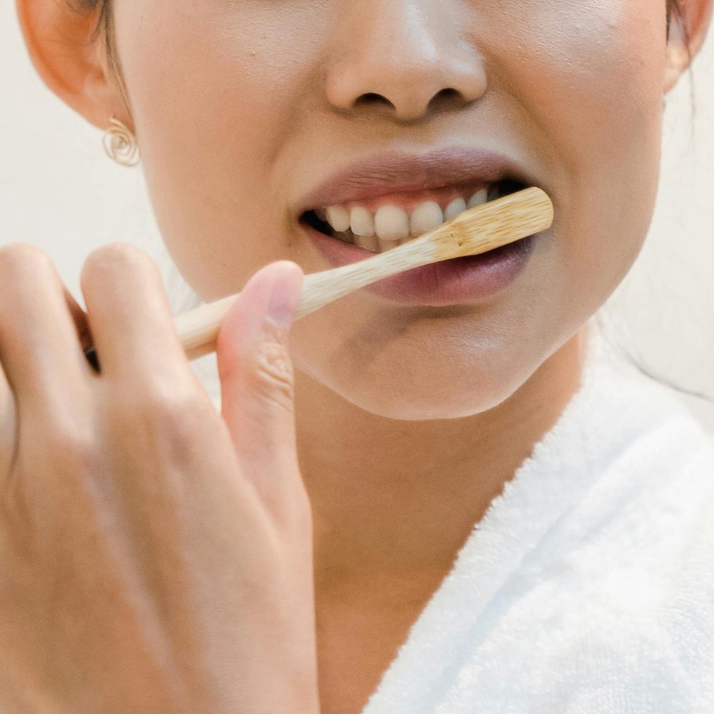 lady brushing teeth